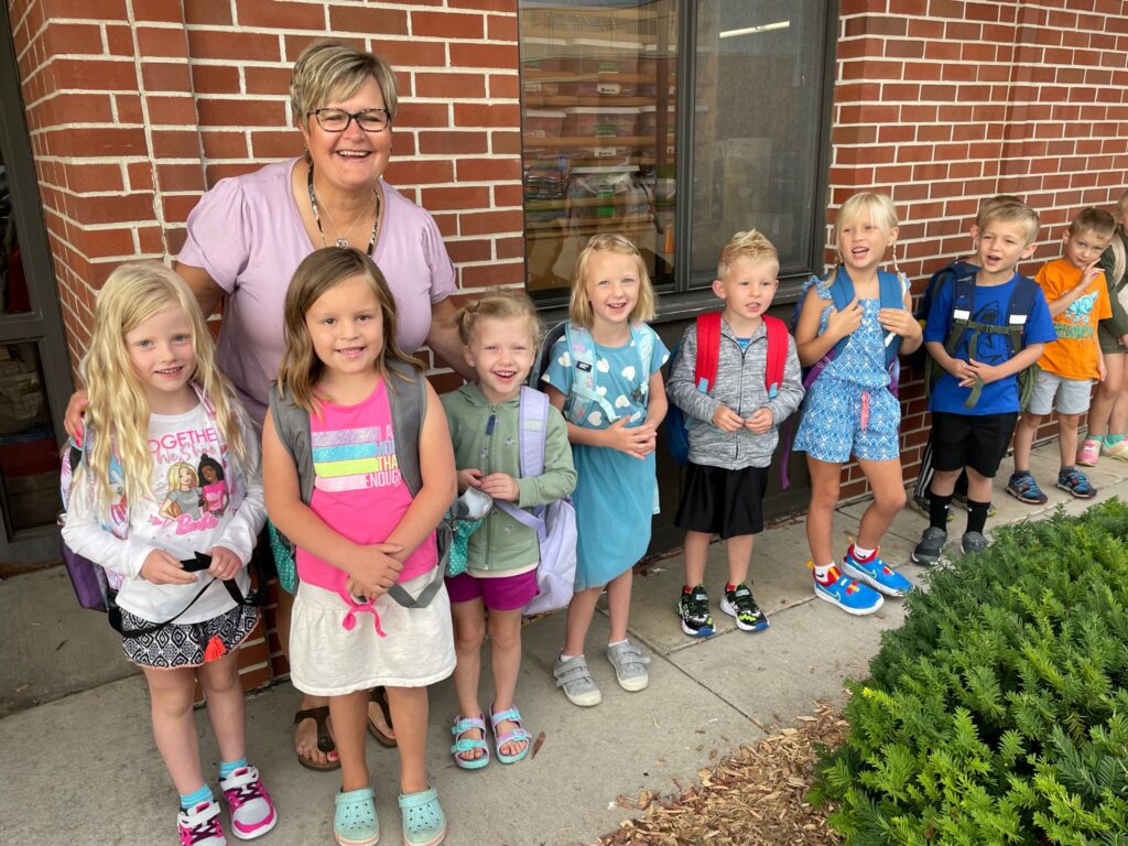 Mrs. Johnson with students on the first day