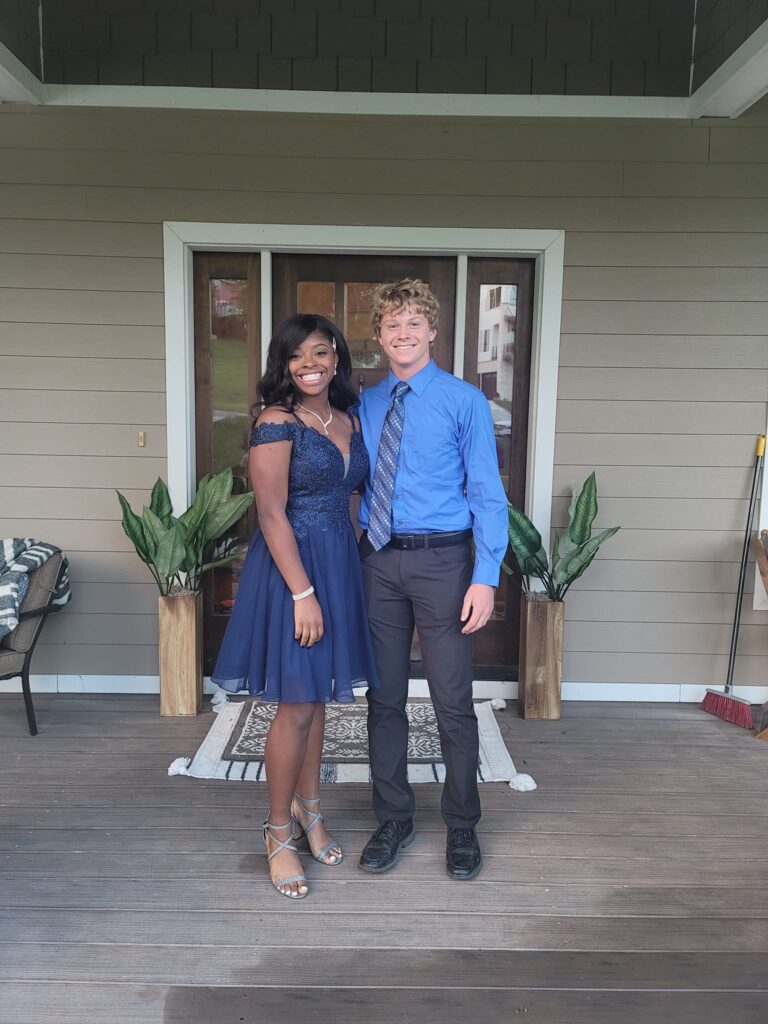 2 students dressed for the homecoming dance
