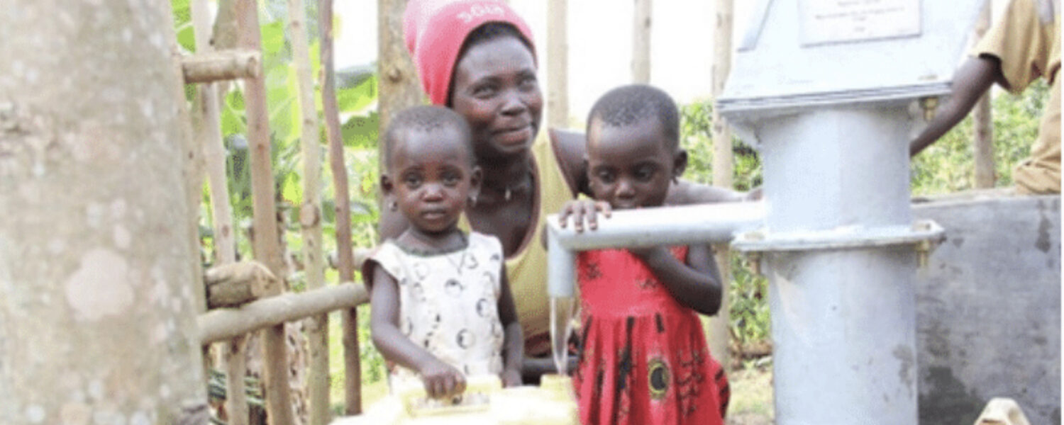 Ugandan family using well